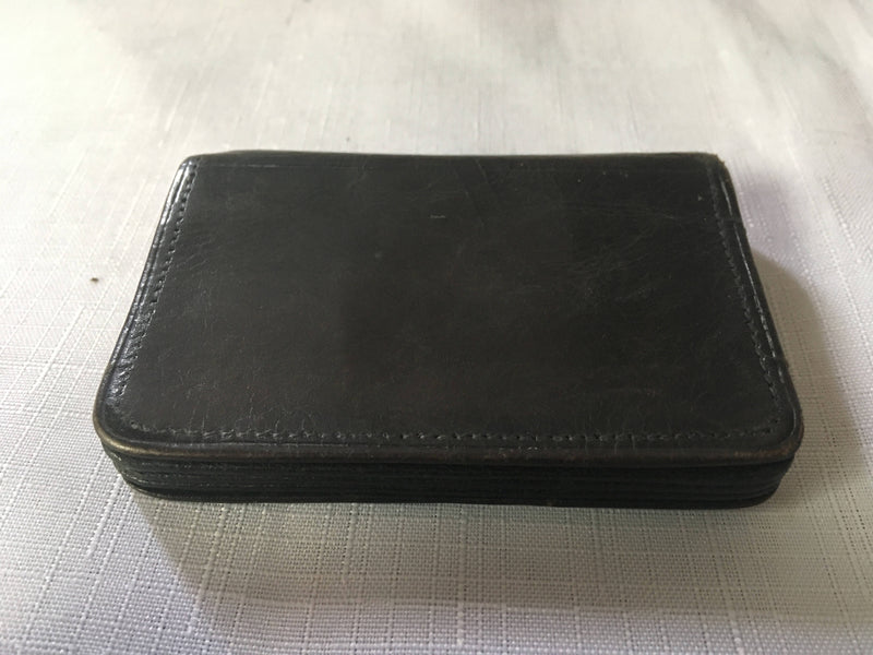 Victorian silver mounted black leather purse. London 1899 Thomas De La Rue & Co.