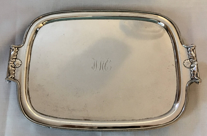 Georgian, George III, Old Sheffield Plate, twin handled waiter on leaf feet. Circa 1800.