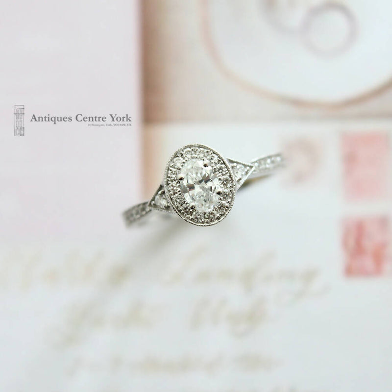 18ct White Gold Oval Diamond Halo Cluster Ring