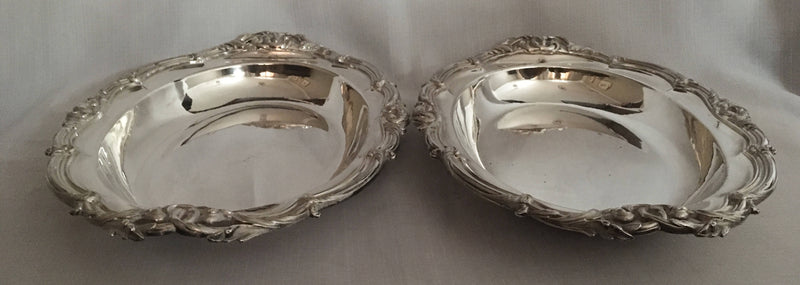 Late Georgian pair of Sheffield Plated, crested, entree dishes and covers.