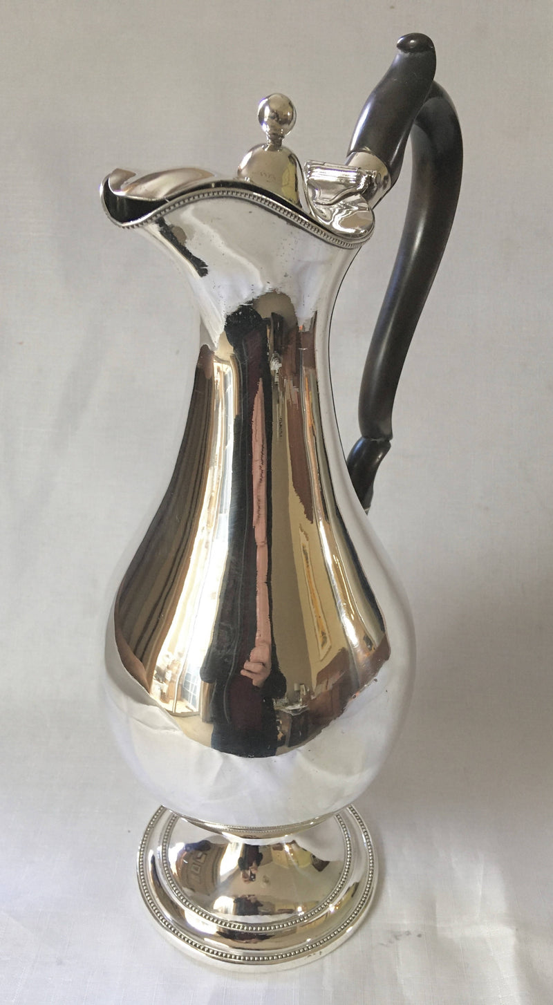 Large, early 19th century, silver plated wine jug of baluster form.