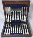Victorian cased set of crested silver plate and mother of pearl dessert cutlery for twelve. Elkington 1880 and 1881.