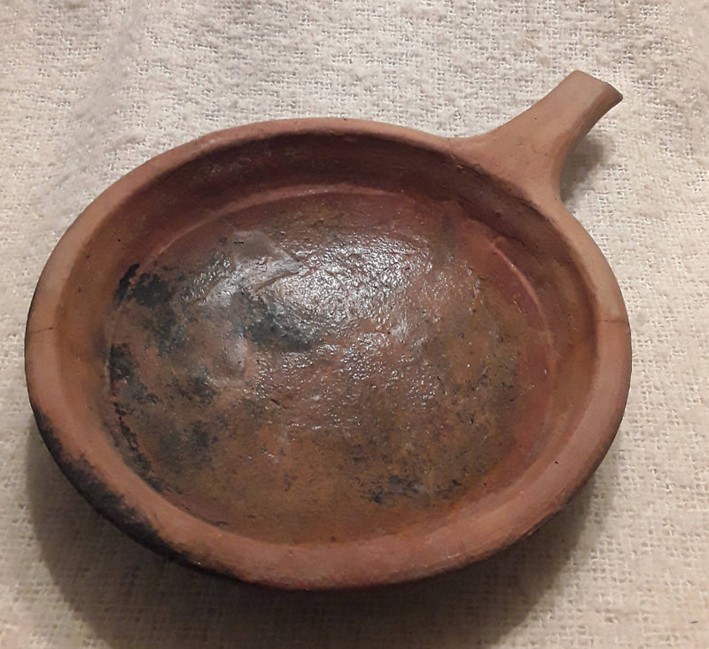 A Medieval Period Terracotta Shallow Skillet.