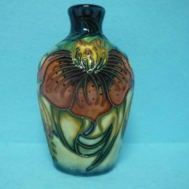 A Boxed Moorcroft Vase in the Anna Lily Design by Nicola Slaney.