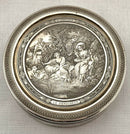 Edwardian Circular Silver Box. Engraved with Le Denicheur, after Boucher. London 1910 Andrew Barrett & Sons. 6.7 troy ounces.