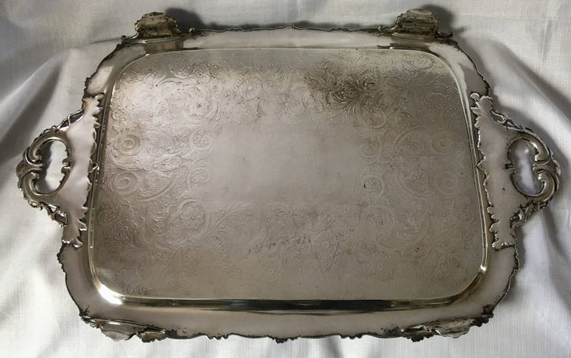 Georgian, George IV period, twin handled Old Sheffield Plate serving tray on four ornate feet. Circa 1820 - 1830.