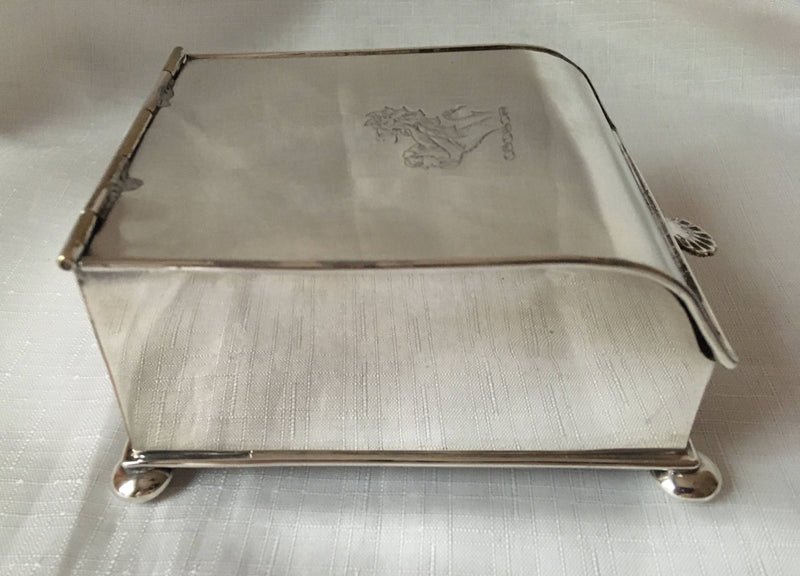 Georgian, Sheffield Plated crested inkstand raised on four bun feet. Circa 1820 - 1830.