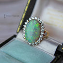 18ct Opal & Diamond Oval Cluster Ring