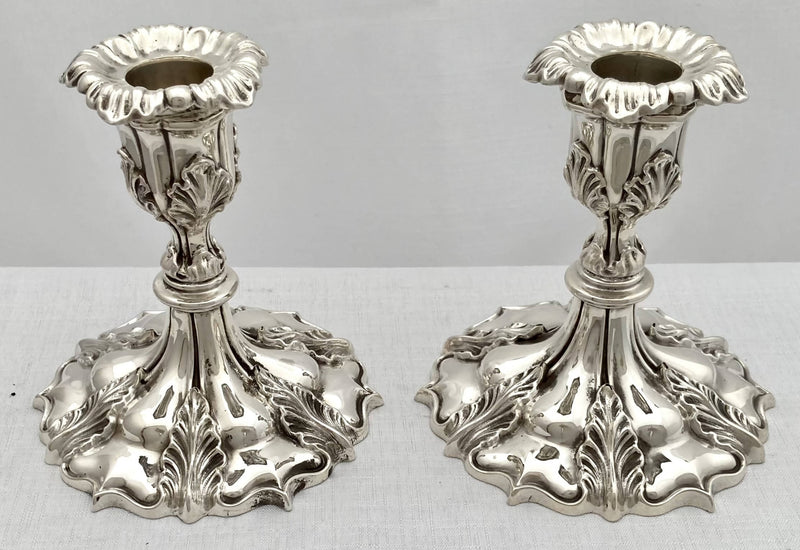 Victorian pair of Elkington silver plated candlesticks with leaf decoration. Elkington & Co 1897.