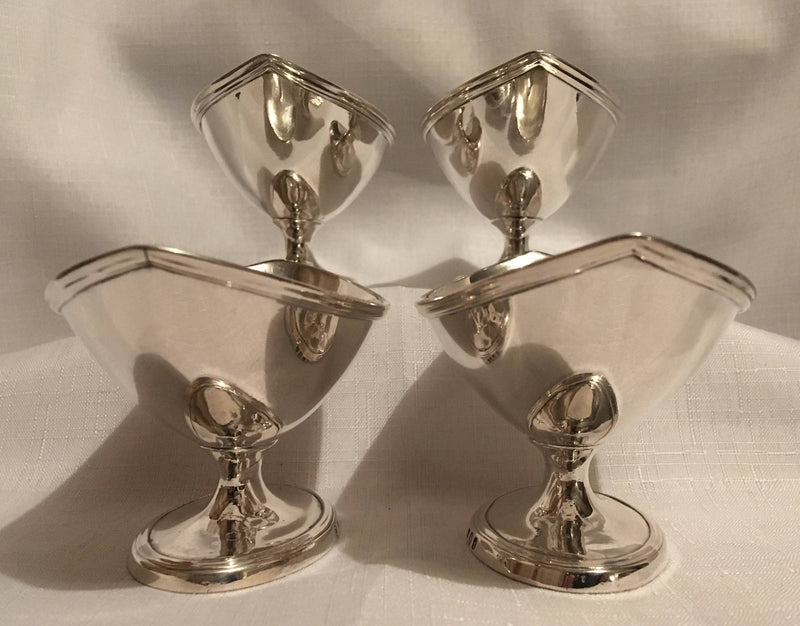 Georgian, George III, matching set of four silver pedestal salts. London 1784 Abraham Peterson & Peter Podio. 12.8 troy ounces.