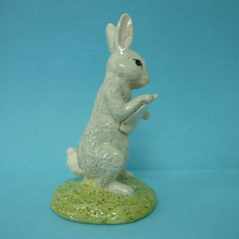 A Royal Doulton Winnie The Pooh Figurine Rabbit Reads The Plan WP23 - In Excellent Condition.