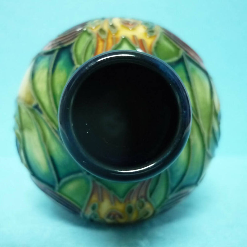 A Boxed Moorcroft Vase in the Anna Lily Design by Nicola Slaney.