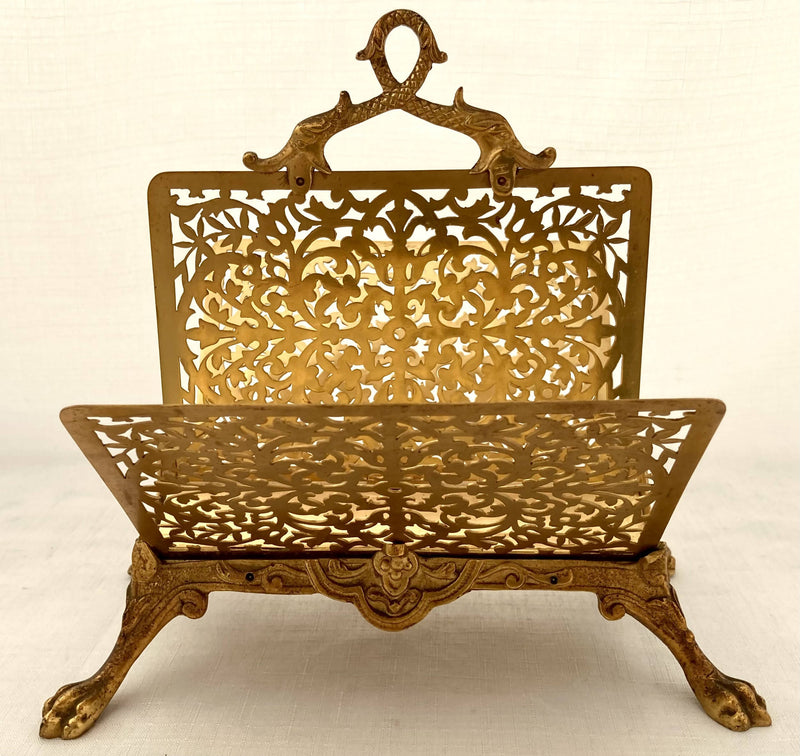 Gilt Metal Correspondence Stand on Lion Paw Feet with Dolphin Handle.