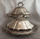 Late Georgian pair of Sheffield Plated, crested, entree dishes and covers.
