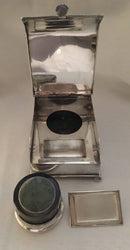 Georgian, Sheffield Plated crested inkstand raised on four bun feet. Circa 1820 - 1830.