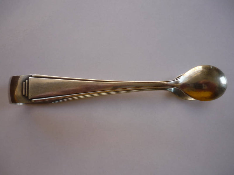 A Pair of Art Deco Style Silver Plate Sugar Tongues in the Pyramid Pattern