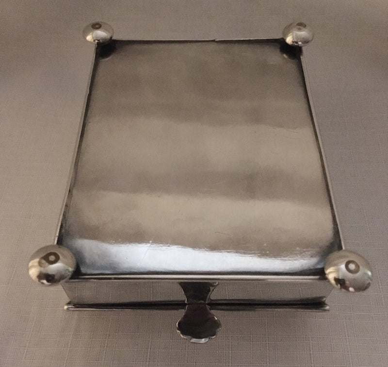 Georgian, Sheffield Plated crested inkstand raised on four bun feet. Circa 1820 - 1830.