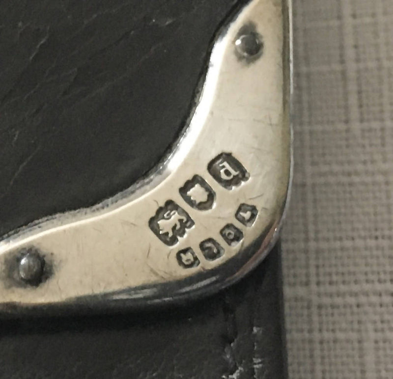 Victorian silver mounted black leather purse. London 1899 Thomas De La Rue & Co.