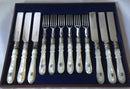 Victorian cased set of crested silver plate and mother of pearl dessert cutlery for twelve. Elkington 1880 and 1881.